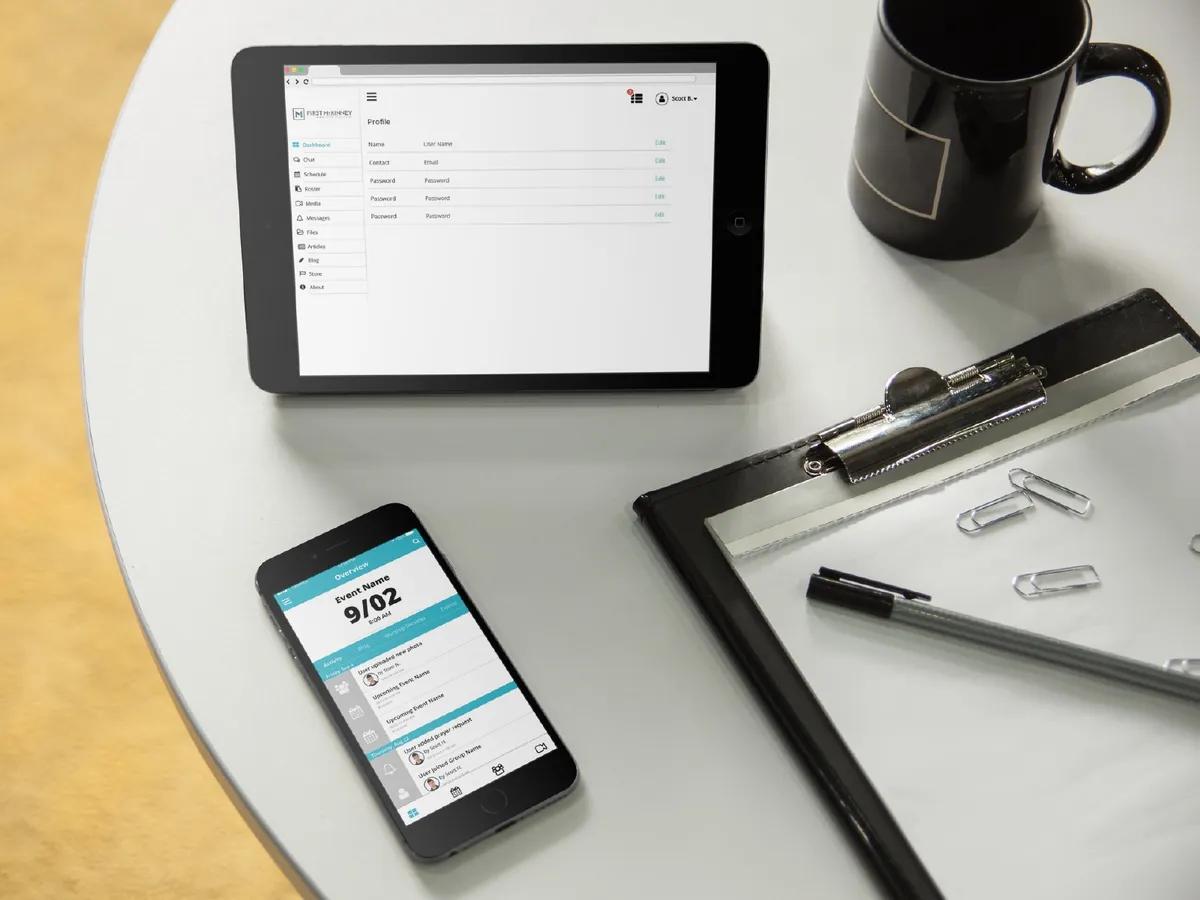 A tablet showing the Unify web profile page and a phone showing the app's event overview, on a table with a mug and clipboard