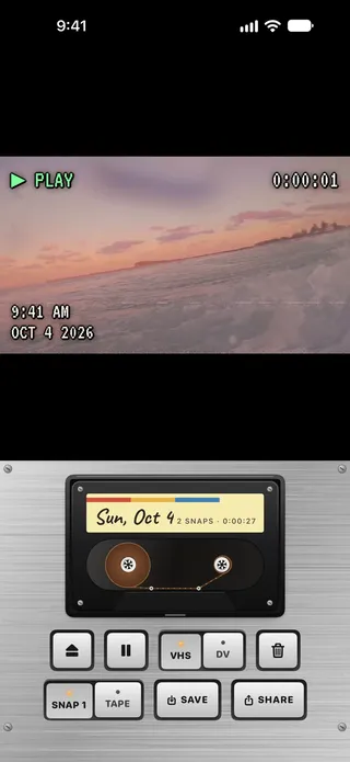 A tape playing back: PLAY over a sunset sea, with Sunday's cassette, 2 snaps, in the player above its keys.