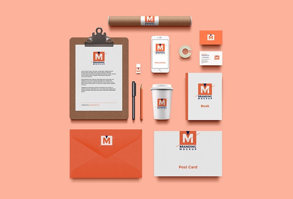 Mockup of one brand applied to stationery, a phone, a cup, an envelope, a book and a post card