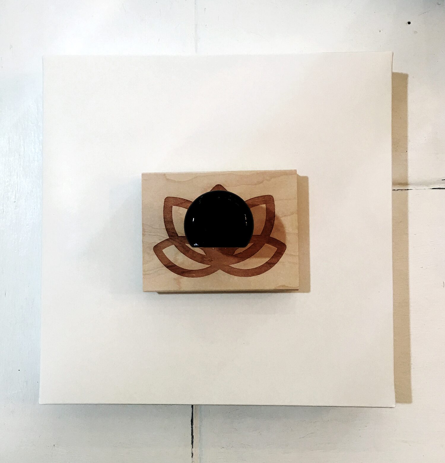 The wooden Lotus flower stamp used on the boxes and cards